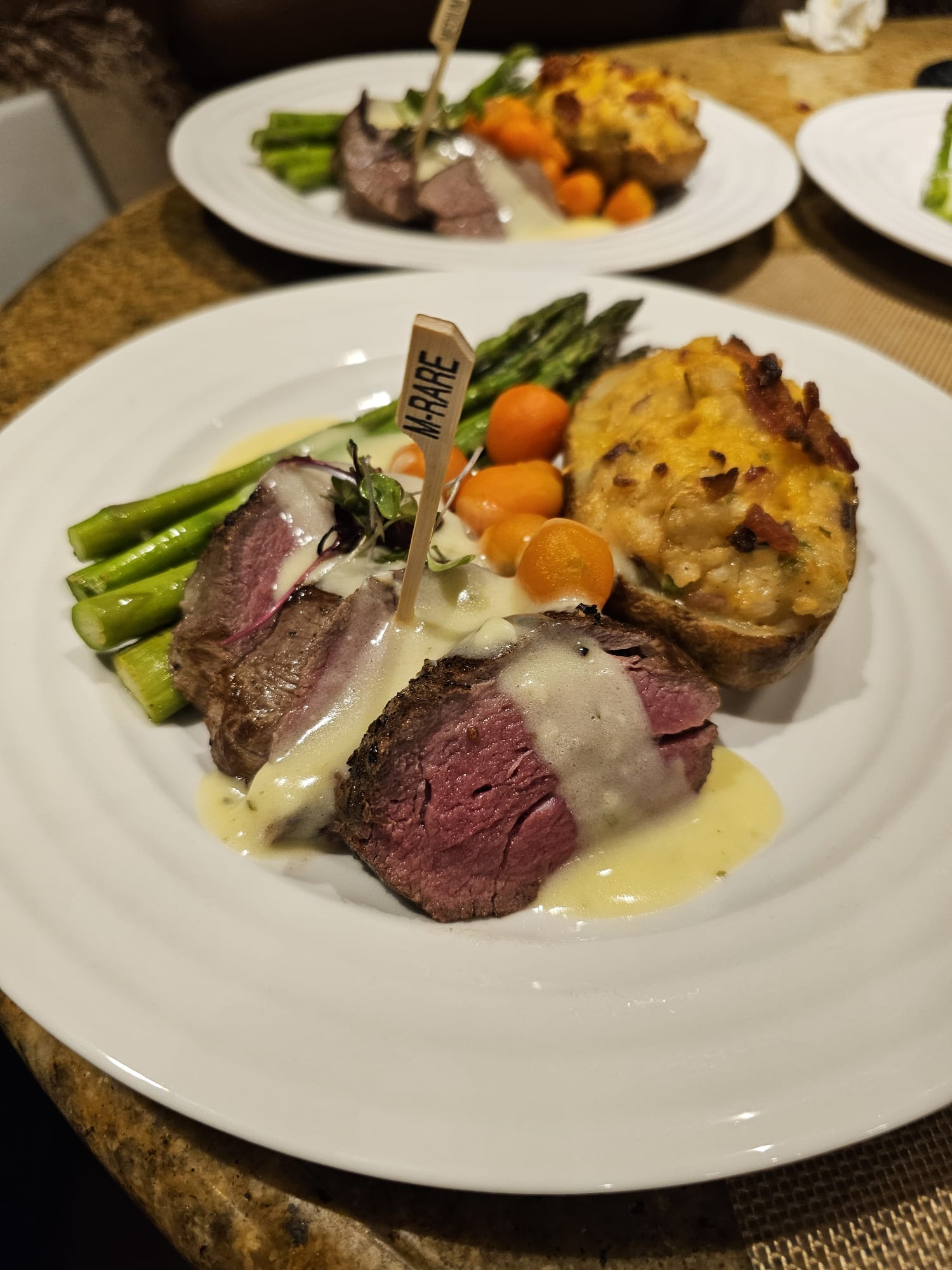 Sliced Filet of Beef with Bearnaise Sauce, Twice Baked Potatoes, Roasted Asparagus